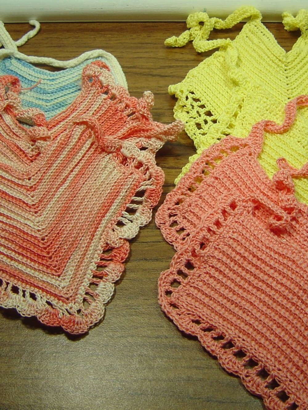 Lot of 7 vintage hand crocheted baby bibs-pastel colors